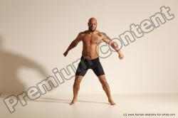 Underwear Gymnastic poses Man Black Muscular Bald Dancing Dynamic poses Academic